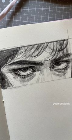 a pencil drawing of a man's eyes