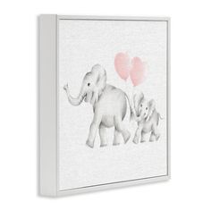 an elephant family with two baby elephants holding pink heart balloons on a white background canvas wall art print