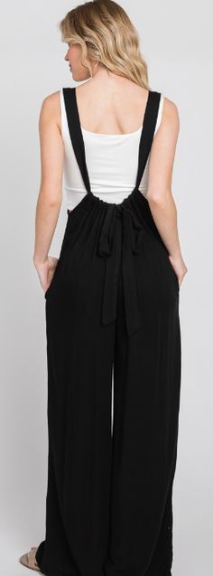 WASHED RAYON CROSSHATCH SUSPENDER STYLE JUMPSUIT. INSEAM 20" Fabric Contents 100% RAYON CROSSHATCH Made in USA Trousers Street Style, Split Decision, Black Suspenders, Huggie Earrings Silver, Chic Summer Style, Style Jumpsuit, Black Tulips, Black Overalls, How To Hem Pants