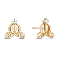 Look at this piece of jewelry and be amazed by its simplicity. It isn't big, elaborate, or flashy but is very powerful in its appeal. Crafted in 14k yellow gold over sterling silver, this carriage-shaped stud earrings has an emblematic design. At the tip of the carriage's top is a diamond that has a soft sparkle - one that would not interfere with your glow and will give way for you to shine. Disney Gold Earrings As Gift, Disney Gold Earrings For Gift, Gold Disney Earrings For Gift, Cinderella Engagement Rings, Enchanted Disney, Cinderella Carriage, Enchanted Disney Fine Jewelry, Disney Fine Jewelry, Designer Diamond Jewellery