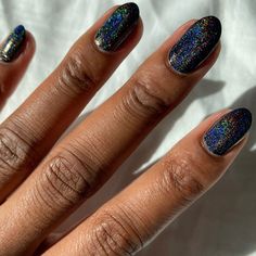 We Trippy is a sparkling linear holographic top coat. This special effect nail polish transforms your look from plain to prismatic. Layer this over a base color or wear opaque for an ultra festive look. Note - Holographic polishes look best under direct light, such as sunlight or strong indoor bulbs, to bring out the rainbow effect.  Ingredients: Butyl Acetate, Ethyl Acetate, Nitrocellulose, Adipic Acid / Neopentyl Glycol / Trimellitic Anhydride Copolymer, Acetyl Tributyl Citrate, Isopropyl Alco Milky Way Nails, Holographic Top, Skin Hand, Glitter Top, Vegan Nail Polish, Holographic Nails, Rainbow Nails, Top Coat, Cool Tones