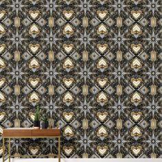 an artistic wallpaper design with gold and black geometric shapes on a dark background,