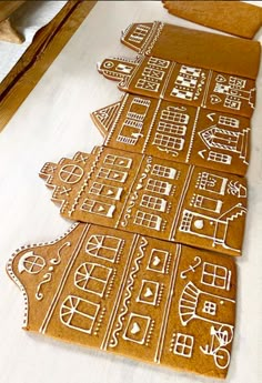 gingerbread cut out to look like the shape of a christmas tree with numbers and symbols on it