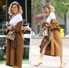 the woman is wearing a brown coat and heels