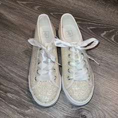 Brand New - Never Worn David's Bridal Sparkle Glitter Sneakers Size 8 Purchased For My Wedding And Winded Up Going A Different Route. They Were Delivered Like This, Without A Box. (There Was A Sticker On The Bottom As The Tag, But It Fell Right Off When I Received Them) Spring Glitter Lace-up Sneakers, Spring White Glitter Sneakers, Low-top Party Sneakers With Laces, Spring Lace-up Sneakers With Glitter Print, Spring Glitter Print Lace-up Sneakers, Gold Glitter Lace-up Sneakers, White Glitter Lace-up Sneakers, Casual White Sneakers For Party, Casual White Party Sneakers