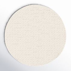 a round white surface with small dots on it