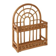 a bamboo magazine rack with an arched top