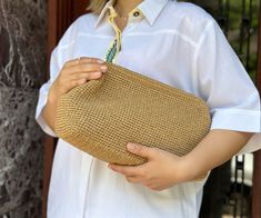 "Make a statement with this elegant x-large raffia beige clutch bag, a perfect Hallowen gift that combines style and functionality! Handcrafted with care, this bag features a stunning straw knitted raffia design that exudes natural charm and sophistication. Designed with a hidden metal lock, this clutch bag adds an extra layer of security for your belongings. The metal lock not only enhances the bag's functionality but also adds a touch of uniqueness to its design. This raffia clutch bag is not only stylish but also a thoughtful gift for Mother's Day. Show your appreciation to your mom or any mother figure in your life with this unique and handmade bag that's sure to make her feel special. ✔️ Suitable for use as hand bag, make-up bag or party bag * Timless and guality handmade crochet prod Chic Beige Straw Bag As Gift, Chic Beige Straw Bag For Gift, Chic Beige Crochet Clutch Bag, Elegant Woven Crochet Bag In Natural Color, Elegant Beige Straw Bag For Travel, Beige Woven Straw Clutch Bag, Woven Beige Straw Clutch Bag, Beige Woven Crochet Clutch Bag, Elegant Handheld Clutch In Natural Color