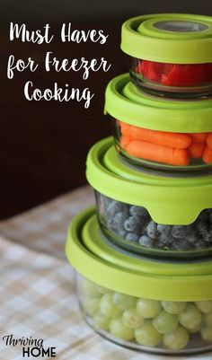 three glass containers stacked on top of each other with food in them and the words must haves for freezer cooking