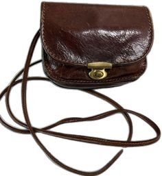 Classic Shoulder Bag With Mobile Phone Pouch, Classic Pouch Shoulder Bag With Mobile Phone Holder, Classic Satchel Mobile Phone Bag, Formal Brown Shoulder Bag With Cell Phone Pocket, Classic Satchel Shoulder Bag For Mobile Phone, Classic Satchel Bag With Cell Phone Pocket, Classic Shoulder Satchel With Cell Phone Pocket, Formal Satchel Bag With Cell Phone Pocket, Classic Clutch Bag With Cell Phone Pocket