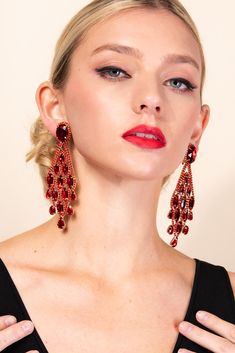 Description Go big or go home and with these teardrop dangle clip-on earrings, you'll be bringing everything you've got. Let your earrings do the talking for you. Chandelier style clip-on earrings with cascading rhinestones that shine from top to bottom. These gorgeous fashion statement jewelry can match any outfit even a simple pair of jeans, making the woman wearing them feel like a princess! Size • Length: 4.35 in (11.05 cm)• Width: 1.35 in (3.43 cm) Quality Made from high-quality lightweight Teardrop Clip-on Earrings For Formal Occasions, Elegant Red Clip-on Earrings For Party, Formal Red Dangle Clip-on Earrings, Red Dangle Clip-on Earrings For Formal Occasions, Luxury Red Clip-on Earrings For Evening, Go Big Or Go Home, Red Peach, Pearl Shop, Chandelier Style