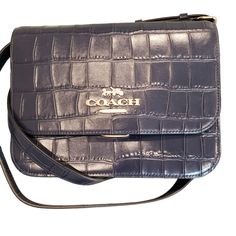 New Coach Brynn Navy Blue Croc Embossed Leather Flap Adjustable Shoulder Bag Nwt. Beautiful Bag In Midnight Blue Croc Embossed Leather. Adjustable Shoulder Strap, Gold Tone Magnetic Snap Lock Front. Two Interior Compartments With One Interior Zip Pocket. Exterior Back Slip Pocket. Measurements In Photos. Coach Textured Leather Rectangular Bags, Coach Textured Leather Rectangular Satchel, Coach Rectangular Textured Leather Satchel, Coach Crossbody Bag In Textured Leather, Coach Crossbody Bag With Textured Leather, Blue Textured Leather Shoulder Bag, Blue Textured Leather Satchel, Leather Duffel, Snap Lock