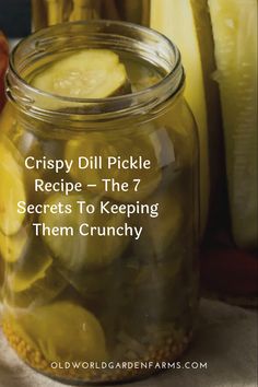 a jar filled with pickles sitting on top of a table