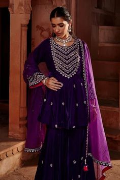 Purple short kalidar kurta with dori embroidery. Comes with gharara and a dupatta.
Component: 3
Pattern: Embroidered
Type Of Work: Dori
Neckline: Round
Sleeve Type: Full
Fabric: Velvet, Organza
Color: Purple
Other Details: 
Embroidered yoke and sleeves
Note : Necklace worn by the model is not for sale.
Occasion: Mehendi and Haldi, Sangeet - Aza Fashions Lehenga Design For Engagement, Lehenga Choli For Kids, Long Lehenga, Simple Lehenga Choli, Women Lehenga Choli, Lehenga Choli Design, Lehenga Online Shopping, Women Lehenga, Girls Lehenga