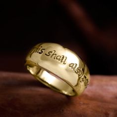 The Ring of Change Gold - Engraved with the phrase - This will also pass. The Ring of change  This is another version of the Happiness ring inscribed in English instead of Hebrew.  The ring of Happiness is tied with a story that originated in Buddhism.  The tale is about two brothers who lived in their father's mansion.  The father was a wealthy man and when his time came, both his sons inherited his fortune. Wealthy Man, Wealthy Men, Silver Rings Simple, Spiritual Symbols, Gold Engraving, Two Brothers, The Father, Dream Ring, One Ring