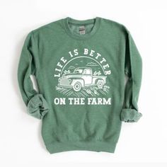 This trendy Gildan unisex graphic sweatshirt from Simply Sage Market is sure to make a great addition to any wardrobe. These sweatshirts are a relaxed unisex fit, please refer to the size chart. Sweatshirt Farm Trucks, Tractor Supply, Heather Green, Clothing Inspiration, On The Farm, Shop Sweatshirts, The Farm, Tractor, Life Is Good