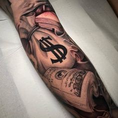 a man's arm with a dollar tattoo on it