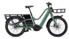 an electric bike with two baskets on the front and back wheels, in green color