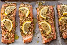 four pieces of salmon with lemons and spices