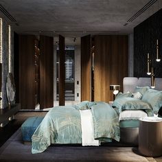 a large bed sitting in a bedroom next to a tall wooden wall