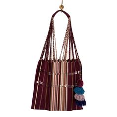 a striped bag hanging from a hook