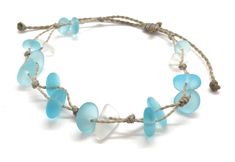 Gorgeous beach bracelet or anklet made with light aqua blue sea glass pebbles on our durable hand spun rope cord. Pure island style! Easy and secure adjustable slide knot closure allows for easy on and off. This bracelet/anklet is completely waterproof and metal free making it perfect for anyone with skin sensitivities and is a wonderful and unique gift for those hard to shop for friends and family on your list, especially the beach lovers! Color: Aqua Blue Size: Available in three sizes. Bracel Blue Glass Beaded Bracelets For Beach, Adjustable Blue Jewelry Made Of Recycled Glass, Adjustable Blue Recycled Glass Jewelry, Adjustable Blue Jewelry With Recycled Glass, Adjustable Recycled Glass Beaded Bracelets For Beach, Adjustable Turquoise Glass Bracelets, Blue Jewelry With Adjustable Cord For Beach, Turquoise Glass Beach Jewelry, Beach Turquoise Glass Jewelry