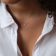 "Our solid 18k gold floating diamond necklace features a 0.20 ctw champagne/white diamond. A small hole is drilled on the top of the diamond and set with a ring. The diamond apears to be floating on the skin. Details: Natural genuine 0.20ctw champagne/ white diamond 18k solid gold chain Adjustable 16-17 inches Hallmarked with VFD and 785 If you have any questions about this necklace, just hit the \"Ask a Question\" button next to the price and we will get back to you within 24 hours. Thanks for Gold Necklace Delicate, Tiny Diamond Necklace, Diamond Necklace Gift, Crescent Moon Necklace Gold, Floating Diamond Necklace, Diamond Tattoos, Delicate Gold Necklace, Diamond Mangalsutra, Kurosaki Ichigo