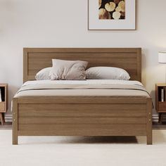 the bed is made and ready for someone to use it in their home or office