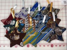 six different ties are hanging on a ruler