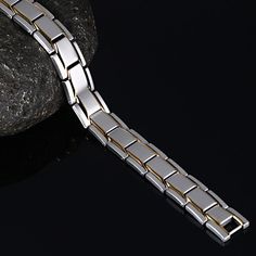 Bold and unique, this bracelet makes an adorable gift for people who are looking for a men's bracelet. Crafted in titanium steel, the bracelet shows a unique and pristine look. Just take this handsome design. It won't disappoint you! Material: Titanium SteelPlating Color: Silver, Yellow Gold Modern Silver Tungsten Carbide Jewelry, Modern Silver Magnetic Bracelet, Modern Silver Magnetic Bracelets, Modern Durable Silver Bracelets, Minimalist Silver Magnetic Bracelet, Silver Minimalist Magnetic Bracelet, Minimalist Magnetic Silver Bracelet, Gift Opening, Health Bracelet