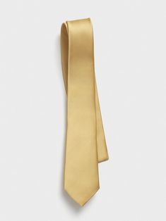 This is the gold standard of ties-literally. Crafted from the finest silk fabric to kick things up a notch. 100% Silk 3 inches wide Suit Prom, Gold Suit, Gold Tie, Senior Prom, Gold Silk, Wedding Rentals, Silk Necktie, Ring Fit, Suit And Tie