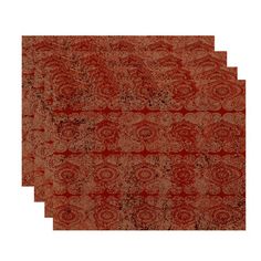 four red rugs with different patterns on them