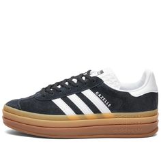 Elevate your style with the adidas Gazelle Bold, literally. Stacked high on three layers of rubber outsole, this classic sneaker boasts buttery-smooth suede uppers. The textured tongue features the adidas logo, while the instantly recognisable 3-Stripes sit on the quarter. An absolute must-have for any sneaker enthusiast..Suede Uppers.Rubber Outsole.Branded Tongue.Serrated 3-Stripes.Lace Closure.Regular Fit Suede Platform Sneakers With Gum Sole For Streetwear, Adidas Suede Sneakers For Skateboarding, Adidas Lace-up Platform Sneakers With Gum Sole, Adidas Low-top Platform Sneakers For Streetwear, Adidas Suede Skate Shoes With White Sole, Adidas Platform Sneakers With Rubber Sole For Streetwear, Adidas Leather Platform Sneakers For Streetwear, Adidas High-top Platform Sneakers With Logo, Adidas High-top Platform Sneakers