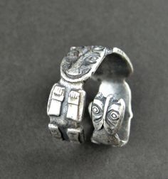 This Vintage, Handmade Ring size 7 to 11, Please indicate what Size needed you will not be able to adjust without going to a Jeweler. This Classy Sterling Silver Ring is made from a .925 Silver Spoon with Beautiful Totem Design of Spiritual significance. Images of the Sacred object that serves as an emblem of a group of People, such as family, clan or tribe.  Has a vintage patina Finish and  polished to a Satin High Shine. This Sterling Silver Ring Weight is 11.6 g Totem Design, Sterling Silver Spoon Ring, Silver Spoon Ring, Mens Stainless Steel Rings, Sterling Silver Spoons, Unique Gifts For Mom, Mixed Metal Jewelry, Retro Ring, Silver Spoon