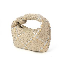 Our handwoven Knot bags are perfect for any occasion! Whether you're headed to a casual brunch, fancy event or a night on the town, this unique bag will make just the right statement. * Woven neoprene & Lycra blend * Zipper enclosure * Shiny gunmetal tone hardware Dimensions: 11" L x 7" H x 2” D, Handle Drop: 3” Brunch Fancy, Knot Bags, Fancy Event, Unique Bags, 7 H, Knot, Hand Weaving, Zipper, Handbags