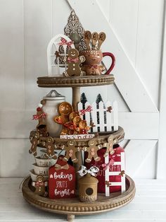 an assortment of gingerbread treats are displayed on a tray