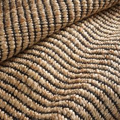 close up view of an area rug with wavy lines