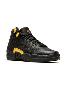 black/gold-tone leather signature Jumpman motif round toe front lace-up fastening ankle-length branded insole rubber sole These styles are supplied by a premium sneaker marketplace. Stocking only the most sought-after footwear, they source and curate some of the most hard to find sneakers from around the world. Luxury Black Jordan Shoes, Luxury Yellow Jordan Sports Shoes, Luxury Black Leather Jordan Shoes, Jordan 12 Black, Jordan 12 Taxi, Jordan 12 Black Taxi, Black Jordans, Air Jordan 12, Trendy Shoes Sneakers