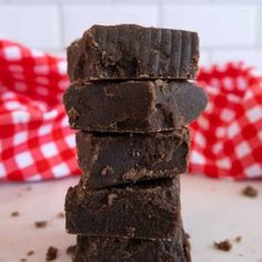 chocolate brownies stacked on top of each other