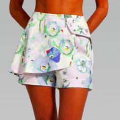 Beautiful Wrap Shorts That You Can Mix And Match Several Tops Or Sweaters, To Create A Look Of Your Own. Feminine Water Color Flowers Print Make It For A Springtime Or Summer Look! Show Off Your Best Asset (Legs!) In This Beautiful Piece! * 100% Cotton Pique * Snap Front Closure * Floral Water Color Print * Wrap Style Mini Shorts * Size Small (4-6) Waist: 27" Hips: 36.5" Brand New, Prices Firm! I Have All My Prices Set Low, So You Get The Best Value. Bundle A Few Items Then I Can Give A Discount Floral Print Short Bottoms For Spring, Chic Floral Print Cotton Shorts, Chic White Floral Print Shorts, Summer Daywear Bottoms Short Length, Spring High-waisted Shorts For Day Out, White Floral Print Summer Pants, White Floral Print Pants For Summer, Spring Bottoms With Built-in Shorts And Short Inseam, Summer Bottoms With Short Inseam For Daywear