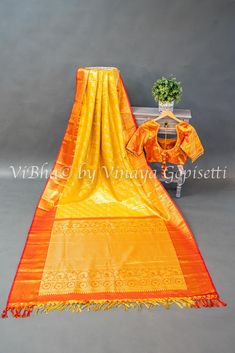 This stunning saree and blouse set is made of luxurious Kanchi silk in a beautiful yellow and red color combination. The intricate weaving and vibrant colors make it perfect for any occasion. Expertly crafted for a flawless fit and timeless style, this saree and blouse set is a must-have for any saree lover. Red Color Combinations, Saree And Blouse, Color Combination, Silk Saree, Timeless Style, Silk Sarees, Red Color, Color Combinations, Timeless Fashion