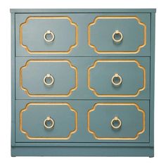 a blue dresser with gold trimmings and knobs on the drawers, against a white background