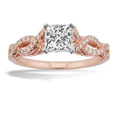 a rose gold engagement ring with a princess cut diamond center and pave set shoulders