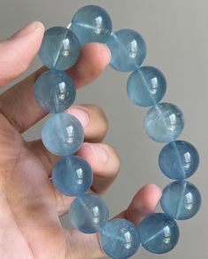 Material:Natural aquamarine beads size :Approx 16mm (Because it is measured manually, the size may vary, 0.5mm-1mm)and the size of each bead is exactly the same. If you mind, please do not buy it. Thank you for understanding   color:blue quantity: one strand  6mm approx 29 pcs one strands 7mm approx25 pcs one strands 8mm approx 22 pcs one strands 9mm approx 21pcs one strands 10mm approx 19 pcs one strands 11mm approx 18pcs one strands 12mm approx 16 pcs one strands 13mm approx 16 pcs one strands Handmade Light Blue Crystal Bracelet With Round Beads, Handmade Aquamarine Beaded Bracelets, Light Blue Aquamarine Bracelets, Aquamarine Beaded Bracelets With Natural Stones, Aquamarine Natural Stone Beaded Bracelets, Beaded Aquamarine Bracelets With Natural Stones, Handmade Light Blue Aquamarine Bracelets, Blue Aquamarine Beaded Bracelets As Gift, Blue Aquamarine Gemstone Beaded Bracelets