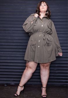 Fit Model is 5'9 and wearing a 2X.?ÿDress?ÿlength is 39" on size 2X?ÿ Weƒ??re pulling out all the stops! Our Charly Trench Dress is your go to piece when you wanna get ƒ??em talking. From the military-styled pockets, to the bright gold buttons, to the sashed waist, to the popped collar; the flair of our Charly Trench D Dress For Chubby Ladies, 2x Dress, Popped Collar, Cute Tights, Affordable Plus Size Clothing, Ferrari F12, Trench Dress, Preppy Dresses, Coat Style