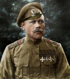 Imperial Russian Army – Superb colourized photo of a Master-Sargent displaying 4 classes of St. George’s cross. Note slight asymmetry of the field shirt and oval cockade on his service hat. Rank and regiment are visible on shoulder boards. Tabbed pocket flaps are also visible. WW1 Life In Russia, Military Insignia, Harbin