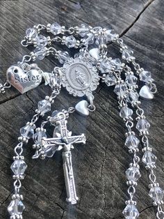 Sister Themed Catholic Rosary. #catholic #catholicchurch #catholicism #catholicfaith #VirginMary #sister #MotherMary #catholics #catholicteens #pray #catholicfaith #catholicfamily #eucharist #praytherosaryeveryday #sisterhood  #bodyofchrist  #MotherMary #jesus #crucifix #Catholicmom #divinemercy  #pray #sistersister #prayers #eucharist #praytherosary #AveMaria #knightsofcolumbus #bodyofchrist #sistergift Spiritual 8mm Beads Jewelry For Birthday, Gift Jewelry With 8mm Crystal Beads, Valentine's Day Silver Jewelry With 8mm Beads, Silver Necklaces With Round Beads For Birthday, Silver Jewelry With 8mm Beads For Valentine's Day, Silver Necklaces With Round Beads For Birthdays, Silver Jewelry With 8mm Beads For Mother's Day, Silver 8mm Beads Jewelry For Valentine's Day, Adjustable Silver Rosary For Mother's Day