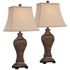 a pair of lamps sitting next to each other