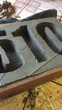 the letters are made out of cement and ready to be put into an oven or stove