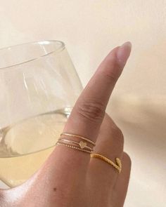 Product Description Featuring a dainty stacking ring with a twisted rope design. Made in 14k gold-fill, she's tarnish-resistant, showerproof, and safe for sensitive skin. Just keep her away from chemicals such as hand sanitizer, soap, and lotion. She looks beautiful stacked or as a solo ring. …………………………………. D E T A I L S • Available from US 5 to 9• Width measures 1mm• Keep away from chemicals such as lotion, soap, and hand sanitizer• Tarnish-resistant, waterproof, and safe for sensitive skin • 1 Teen Ring, Multiple Rings, Soft Toothbrush, Gold Ring Stack, Rope Design, Jewelry Lookbook, Tiny Heart, Dream Jewelry, Dainty Ring